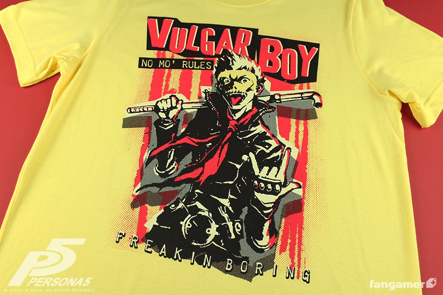 A punky lo-fi image of Ryuji in his Skull outfit printed on a yellow shirt. In cut-out letters and typewriter script, it says "Vulgar Boy" "No mo' rules" and "Freakin Boring"